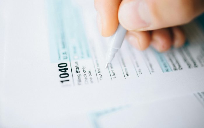 Tax forms on a desk.