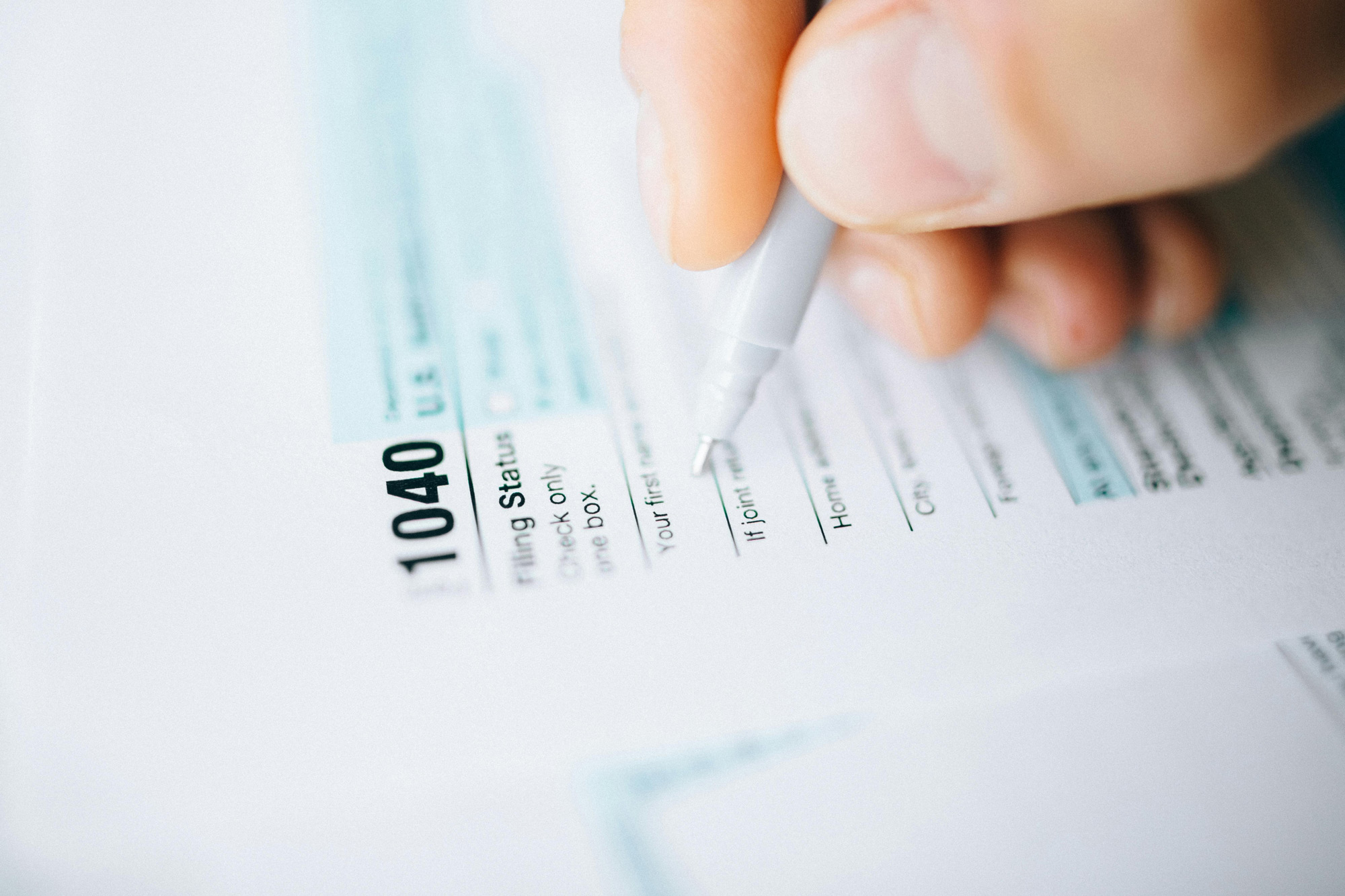 Tax forms on a desk.